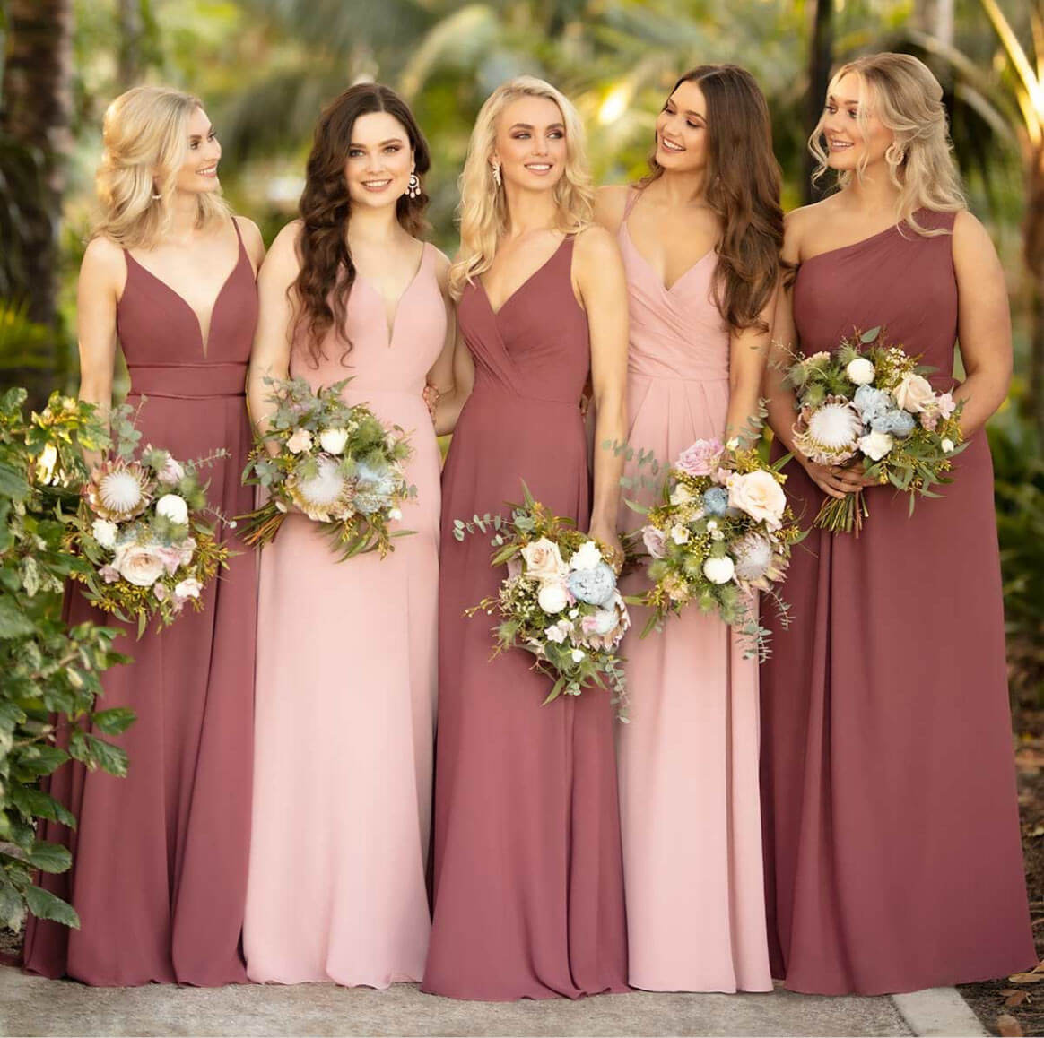 Photo of Models wearing a bridesmaids collection dresses