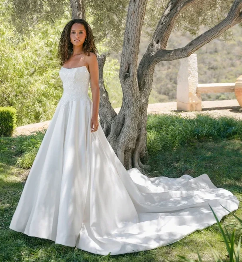 Photo of Model wearing a Morilee Bridal Gown