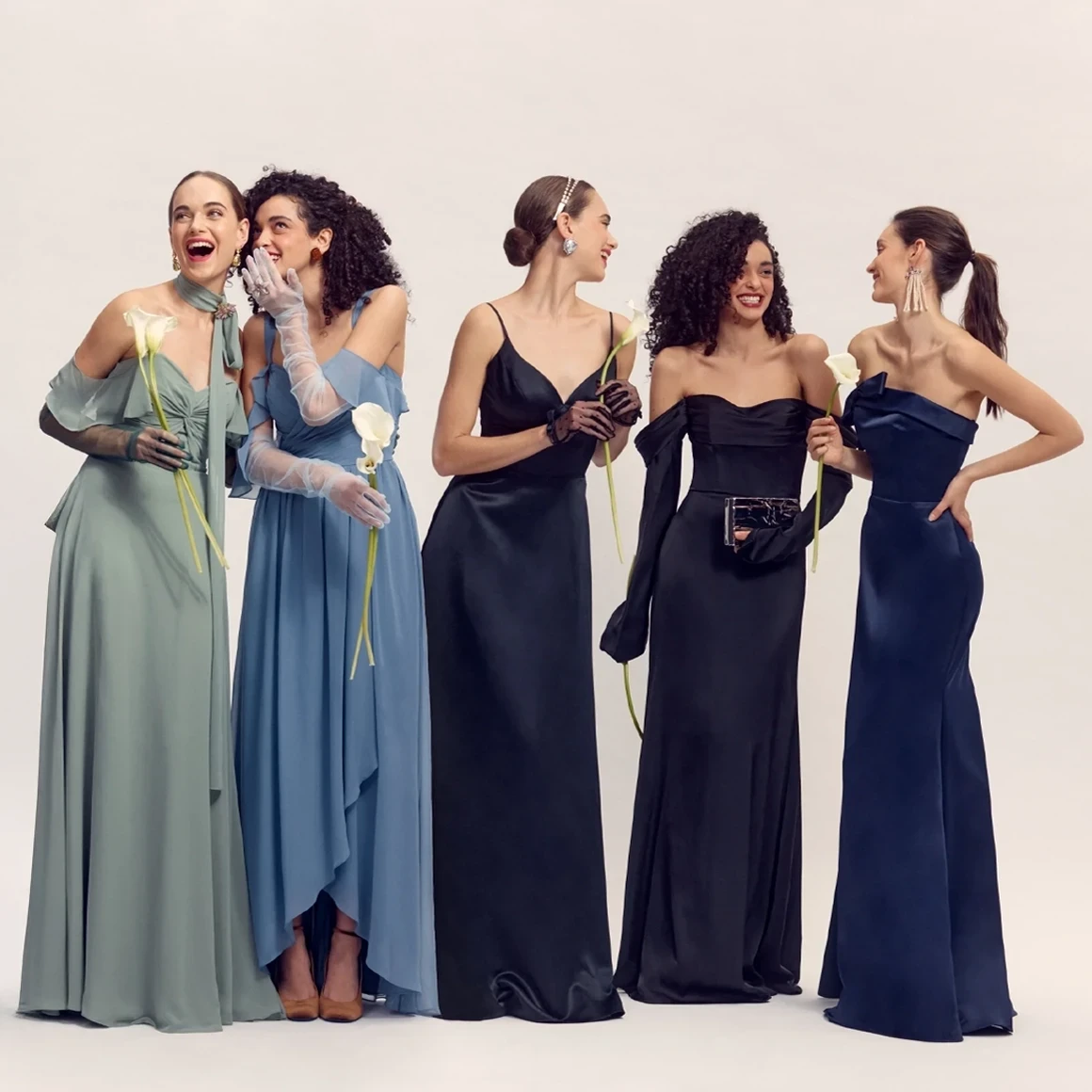 Photo of Models wearing a bridesmaids collection dresses